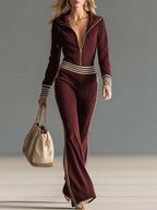 Sienna | Dame Retro sporty mørkeblå strikjumpsuit med hætte, lynlås og V-udskæring
