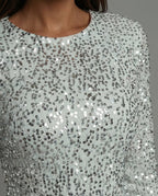 Celeste | Mini-robe à paillettes avec manches longues et silhouette ajustée