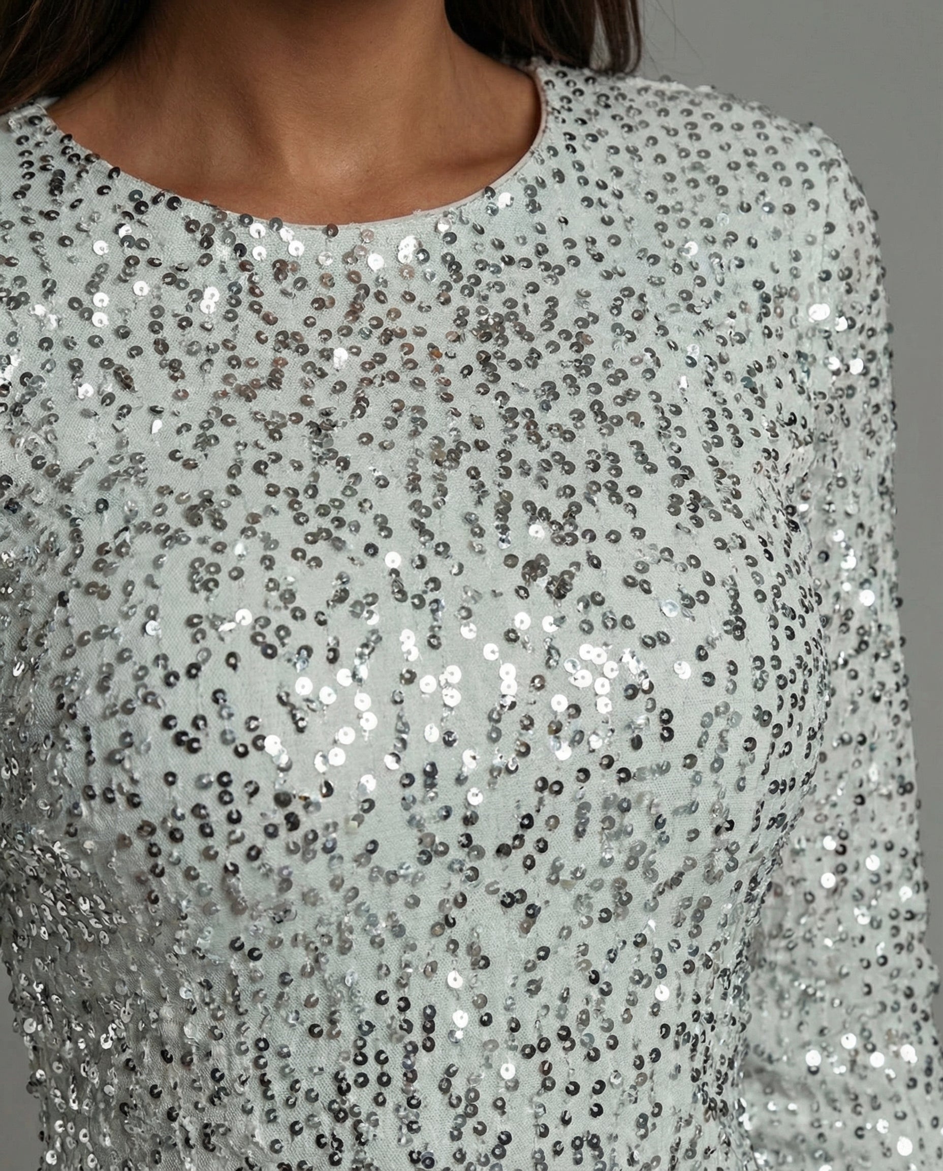 Celeste | Mini-robe à paillettes avec manches longues et silhouette ajustée