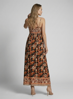 Marbella | Blomstret Maxi Kjole Med Slids Og Smock Overdel