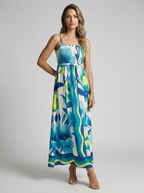 Marbella | Blomstret Maxi Kjole Med Slids Og Smock Overdel