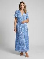 Ava | Elegancka sukienka maxi w kwiatowy wzór z dekoltem w serek