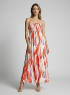 Marbella | Blomstret Maxi Kjole Med Slids Og Smock Overdel