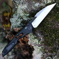 Kompakt foldekniv med Wharncliffe-klinge og udformet greb