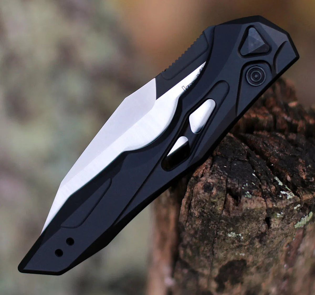 Kompakt foldekniv med Wharncliffe-klinge og udformet greb