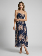 Marbella | Blomstret Maxi Kjole Med Slids Og Smock Overdel