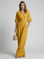 Helena | Elegant Jumpsuit Med V-Udskæring Og Vide Ben