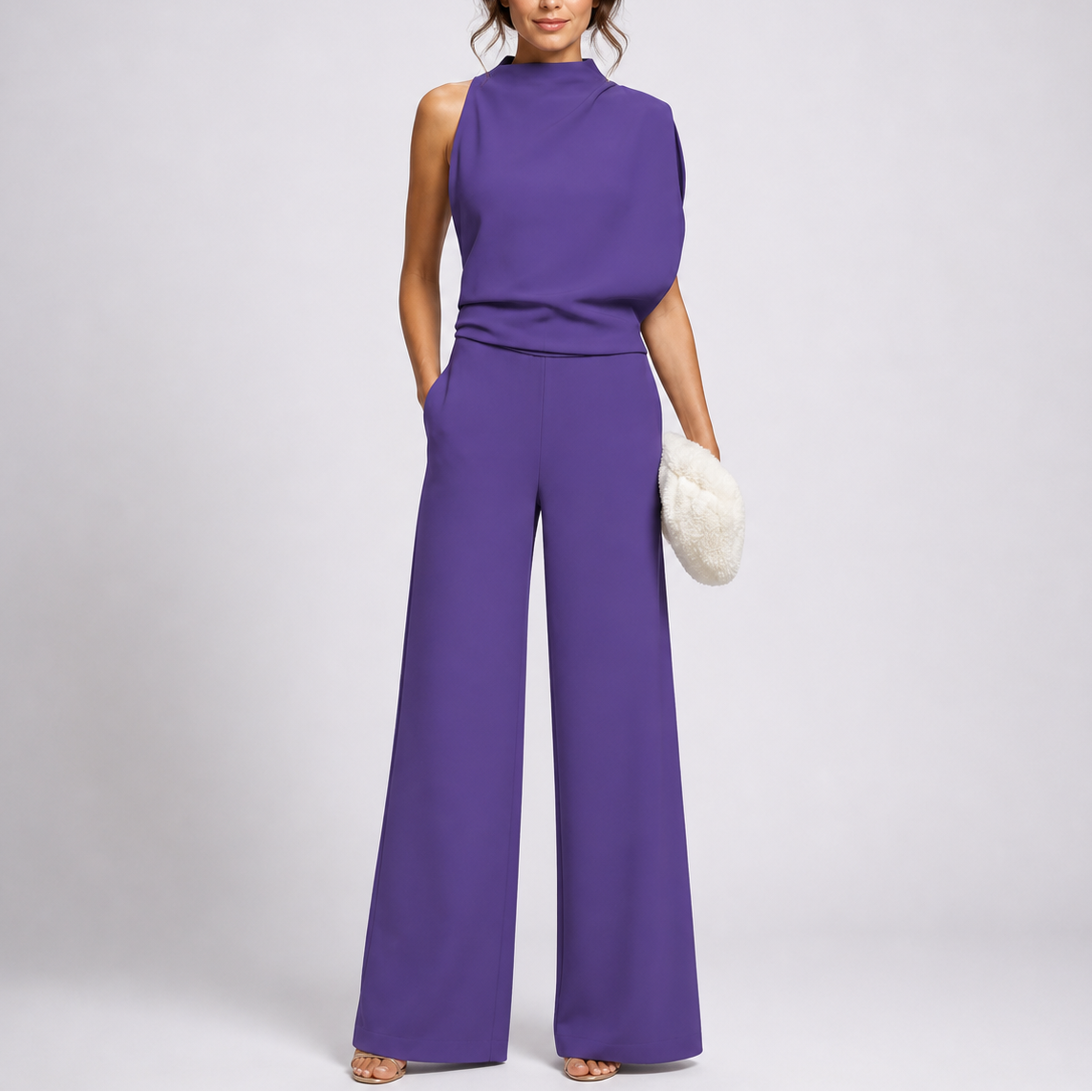 Ærmeløs jumpsuit med høj hals og brede ben
