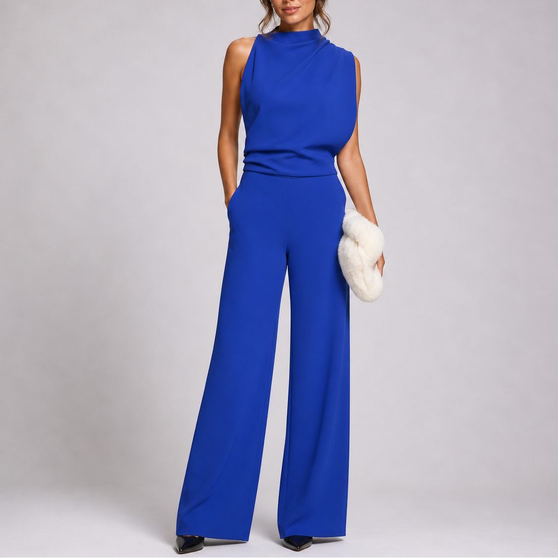 Ærmeløs jumpsuit med høj hals og brede ben