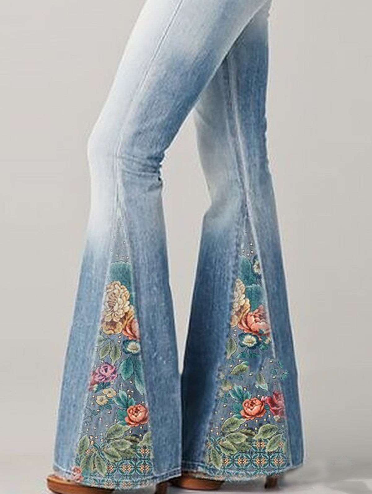 Women's flare jeans in denim with floral embroidery
