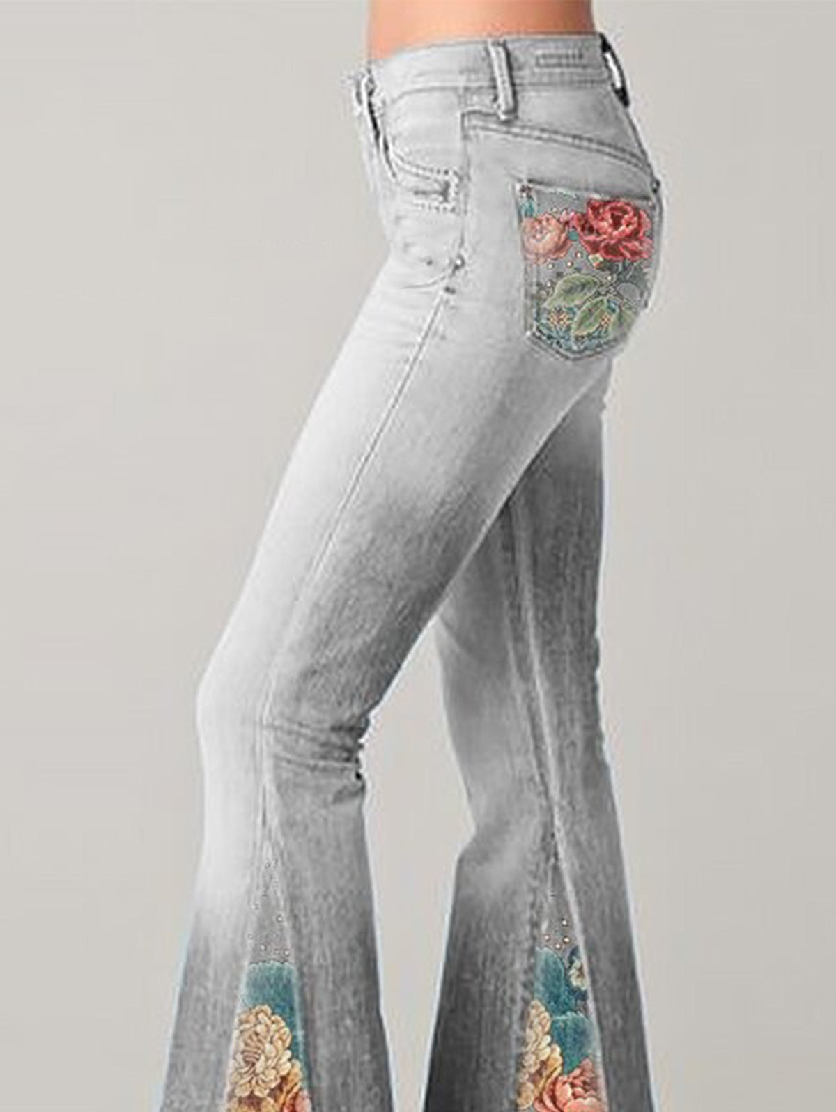 Women's flare jeans in denim with floral embroidery