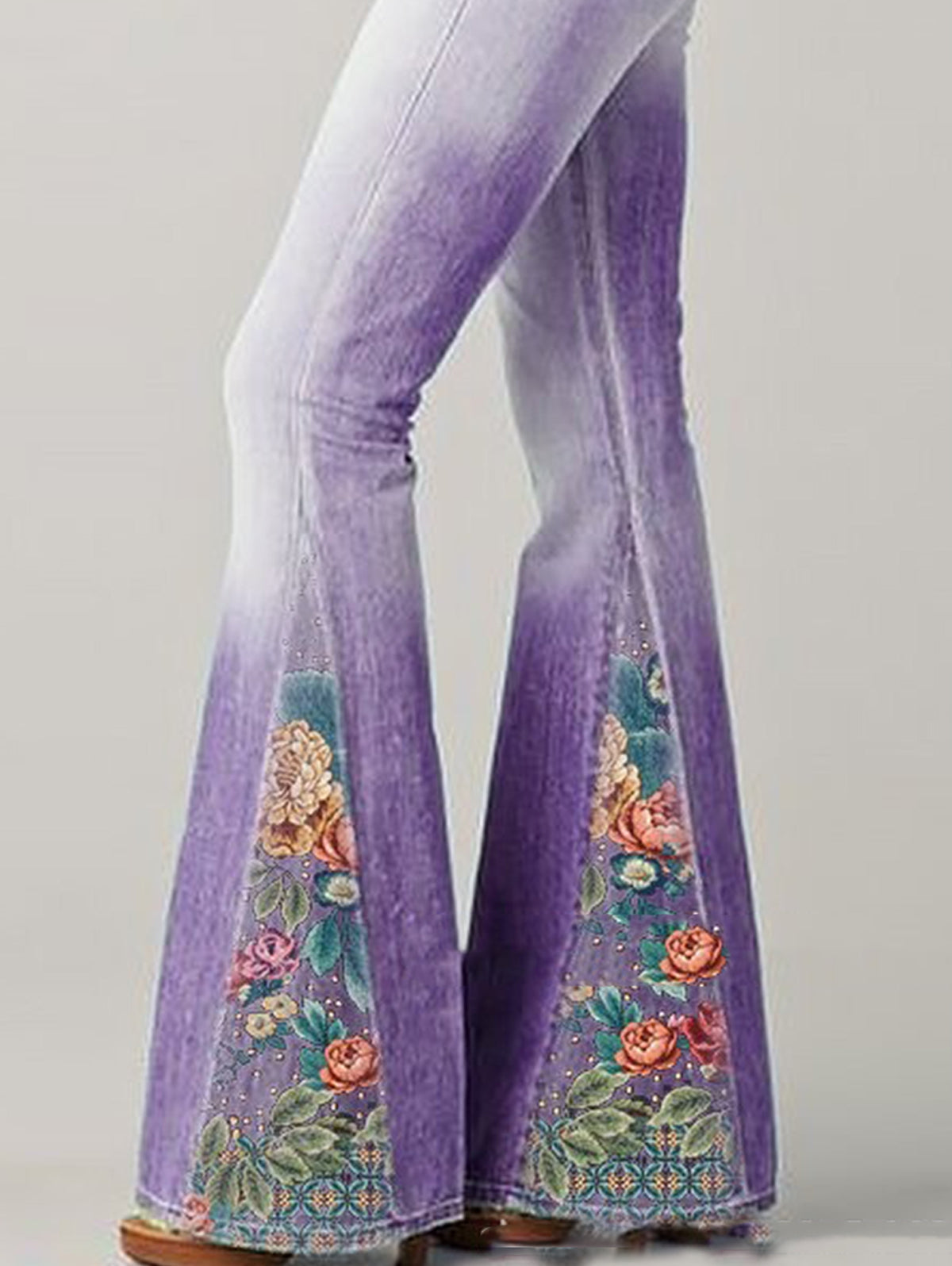 Women's flare jeans in denim with floral embroidery