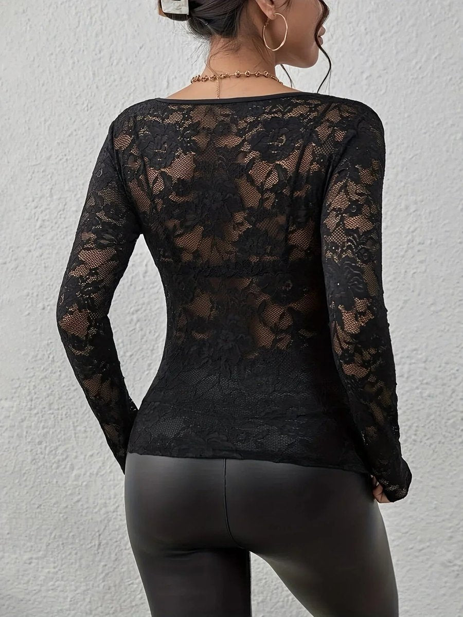 Bluse med blomstret blonde, lange ærmer og dyb v-udskæring